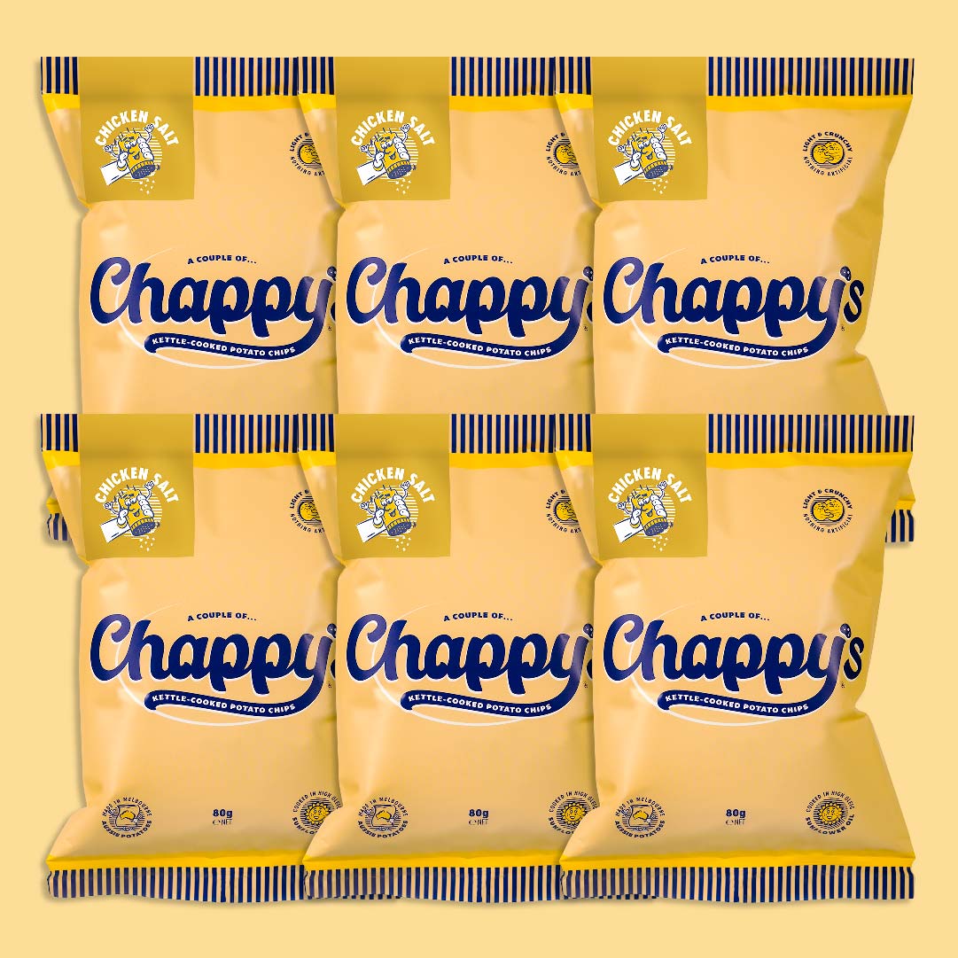 Six packets of Chappy’s Chicken, Salt kettle-cooked potato chips, 85g each, arranged in two rows. Yellow packaging with blue cursive branding, lemon and salt graphics.